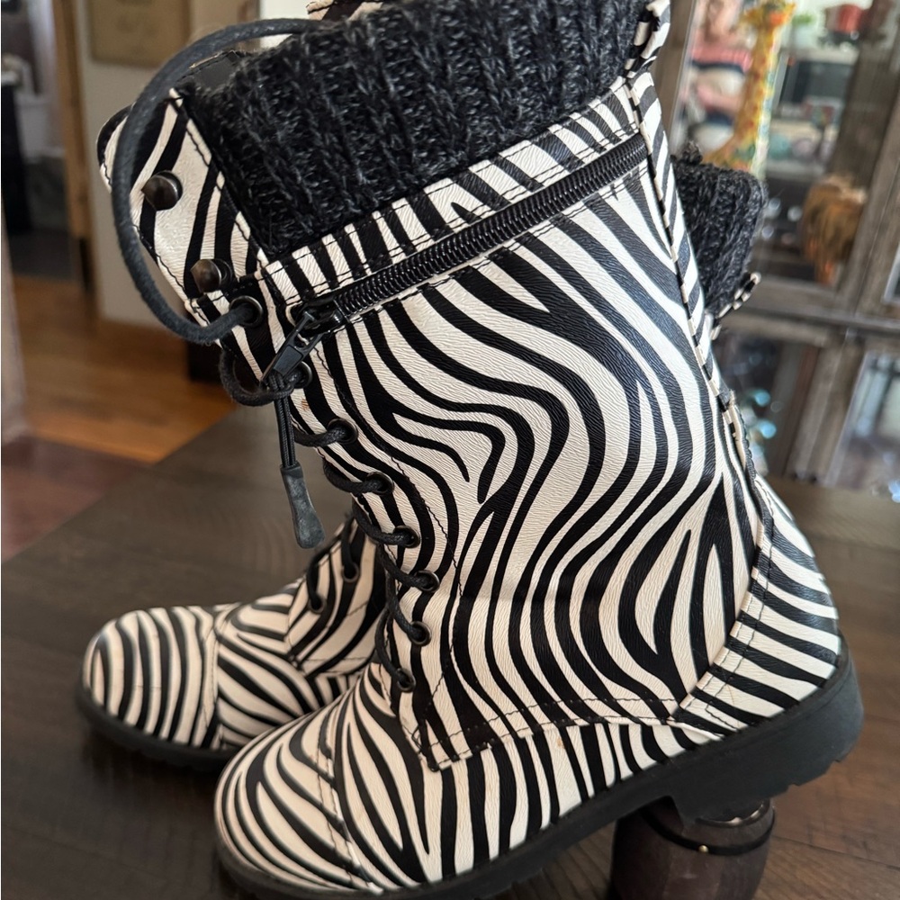 Size 7 zebra boots worn twice.